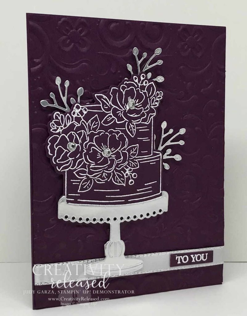 White embossed birthday cake on Blackberry Bliss Cardstock.