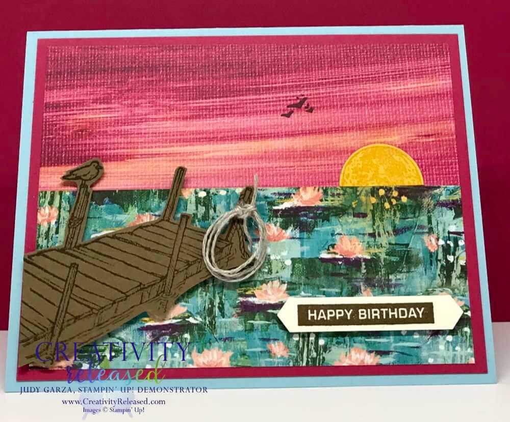Birthday card displaying a lakeside sunset using Stampin' Up! Sale-a-bration Designer Series Paper