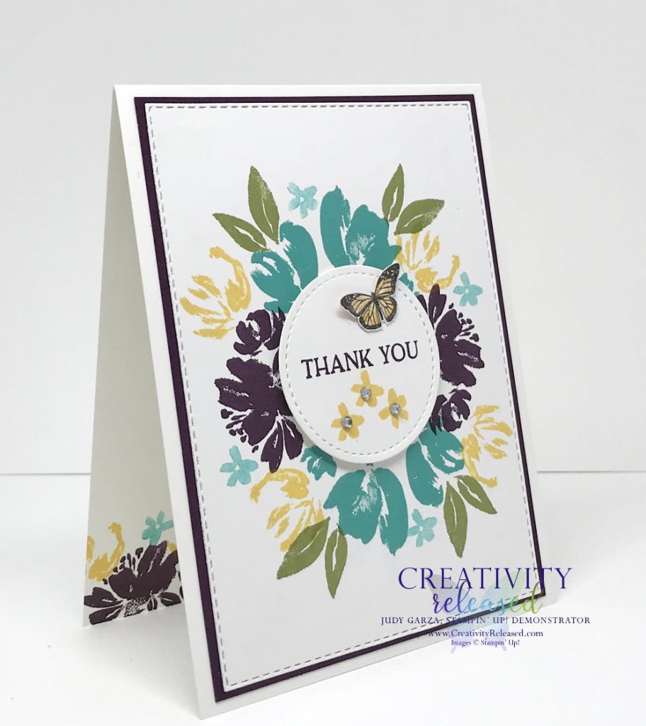 A side view of a floral thank-you card made using the colors Daffodil Delight, Blackberry Bliss and Bermuda Bay, all by Stampin' Up!