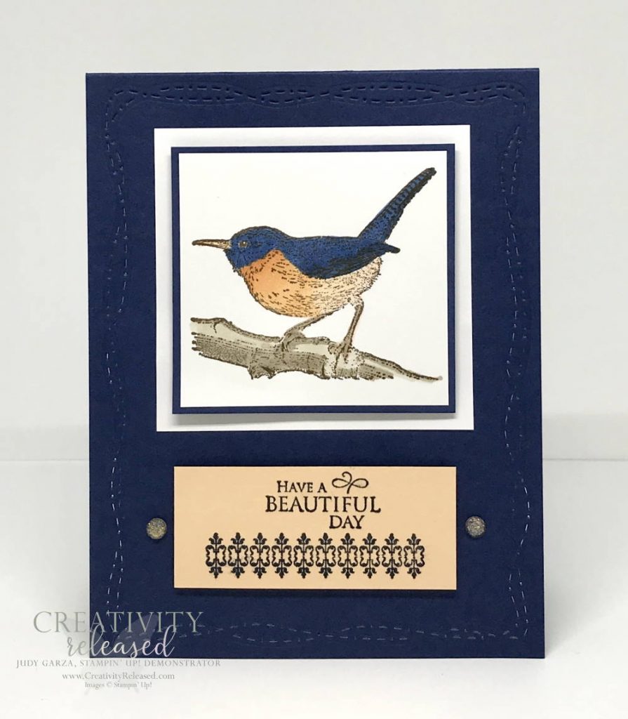 A greeting card in navy and peach that depicts a bird on a branch. The sentiment reads "Have A Beautiful Day." All stamps, ink, supplies and tools used are by Stampin' Up!