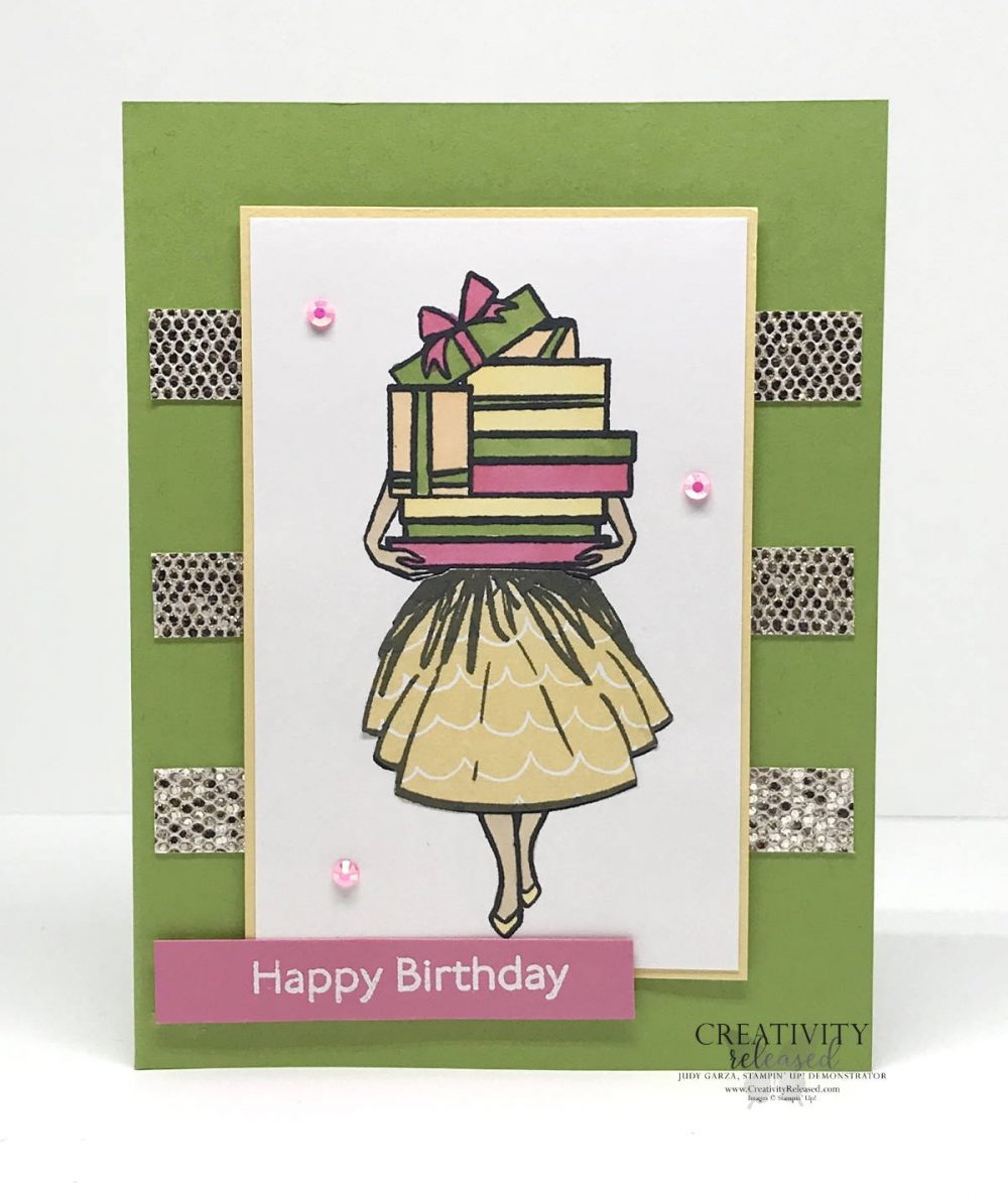 A birthday card using CCMC681 sketch challenge. A lady holding a mound of gifts that are so high they cover her face. Stamp set Delivering Cheer by Stampin' Up!®