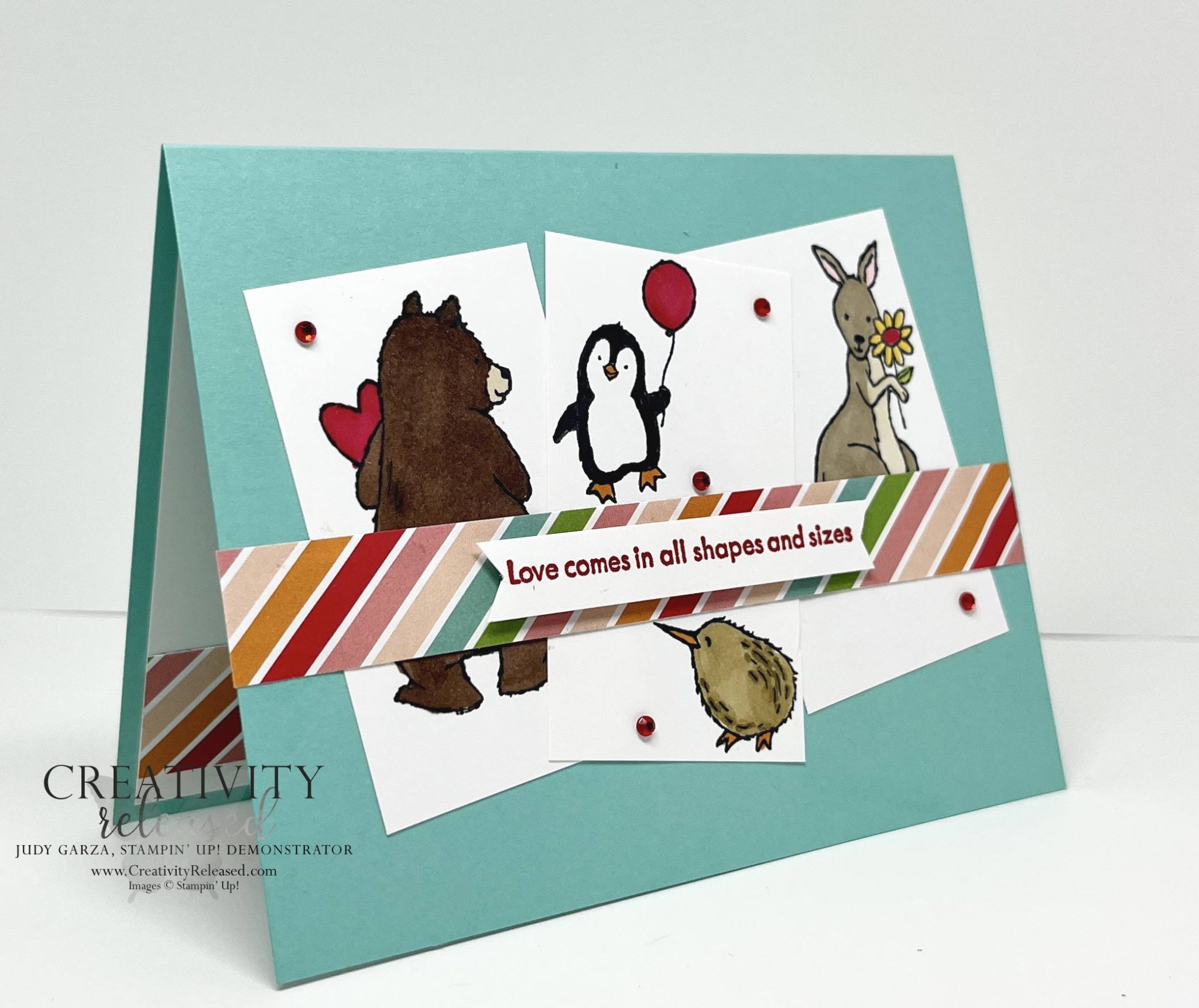 Side view of a greeting card with four different animals that reads, "Love comes in all shapes and sizes."