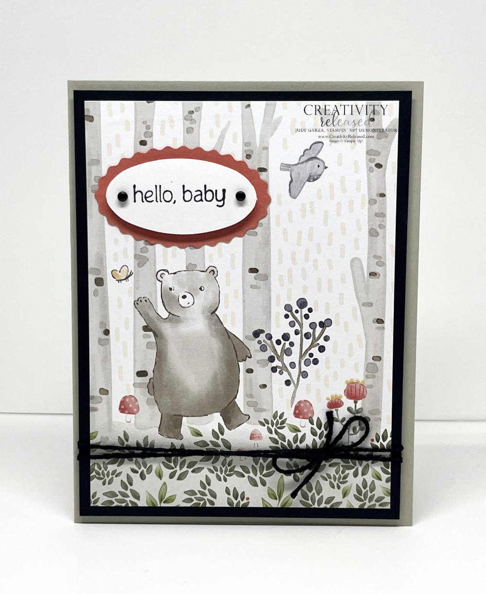 A card to welcome a new baby using the Stampin' Up! Happier Than Happy stamp set with the coordinating designer series paper. This piece features a bear in the woods.