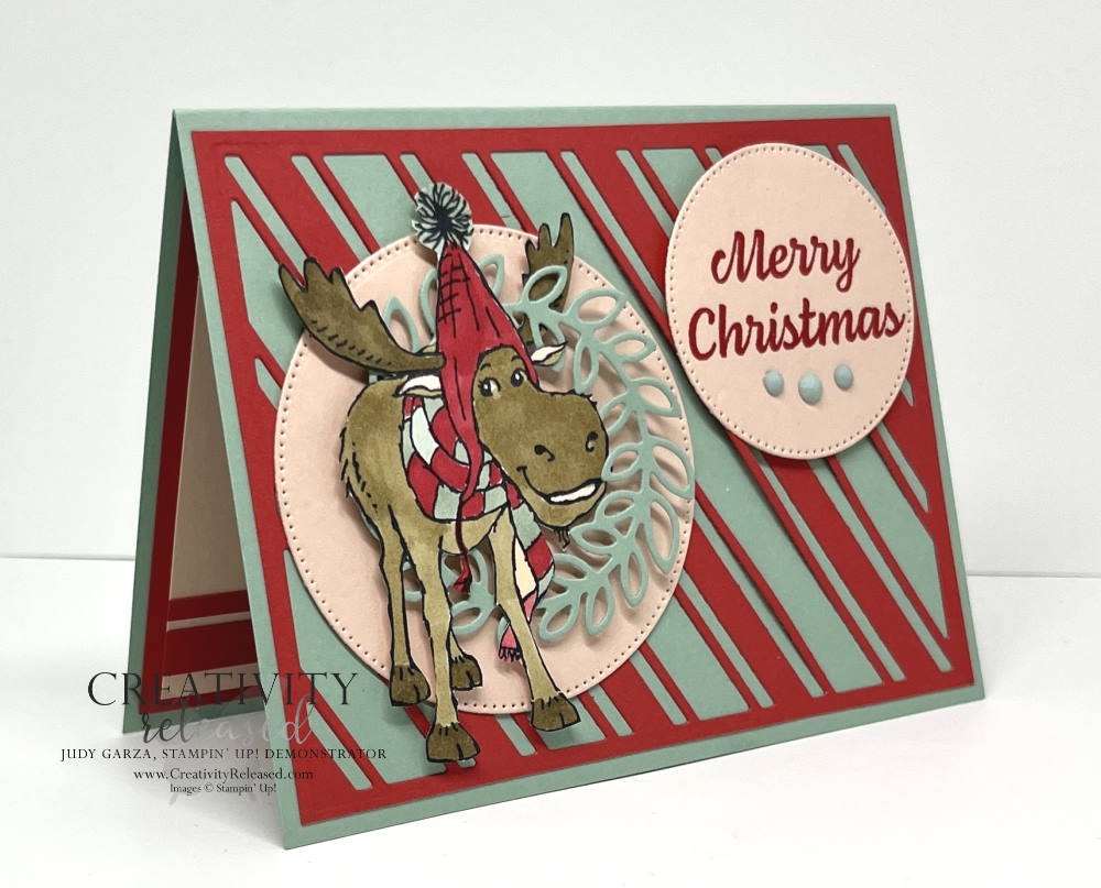 Side view of a whimsical Moose Christmas card using several Stampin' Up! stamp sets and dies in colors Mint Macaron, Poppy Parade and Petal Pink. 