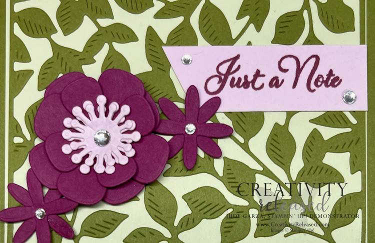 A close-up look at a "Just A Note" greeting card using the Gorgeous Garden and the Paper Florist dies by Stampin' Up!